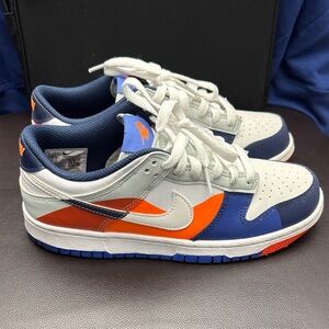 Nike White and Navy Sneakers with Orange Highlights